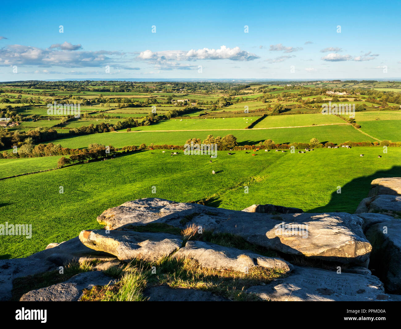Meadows in the Lower Wharfe Valley from Almscliff Crag millstone grit outcrop near Harrogate North Yorkshire England Stock Photo
