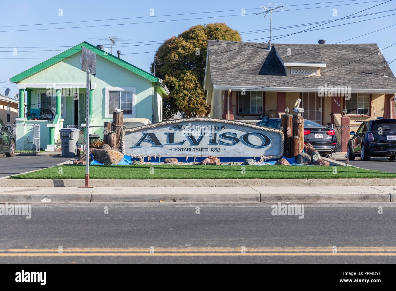 Welcome – Alviso – Established 1852, sign in front of residential houses; Alviso, San José, California, USA Stock Photo