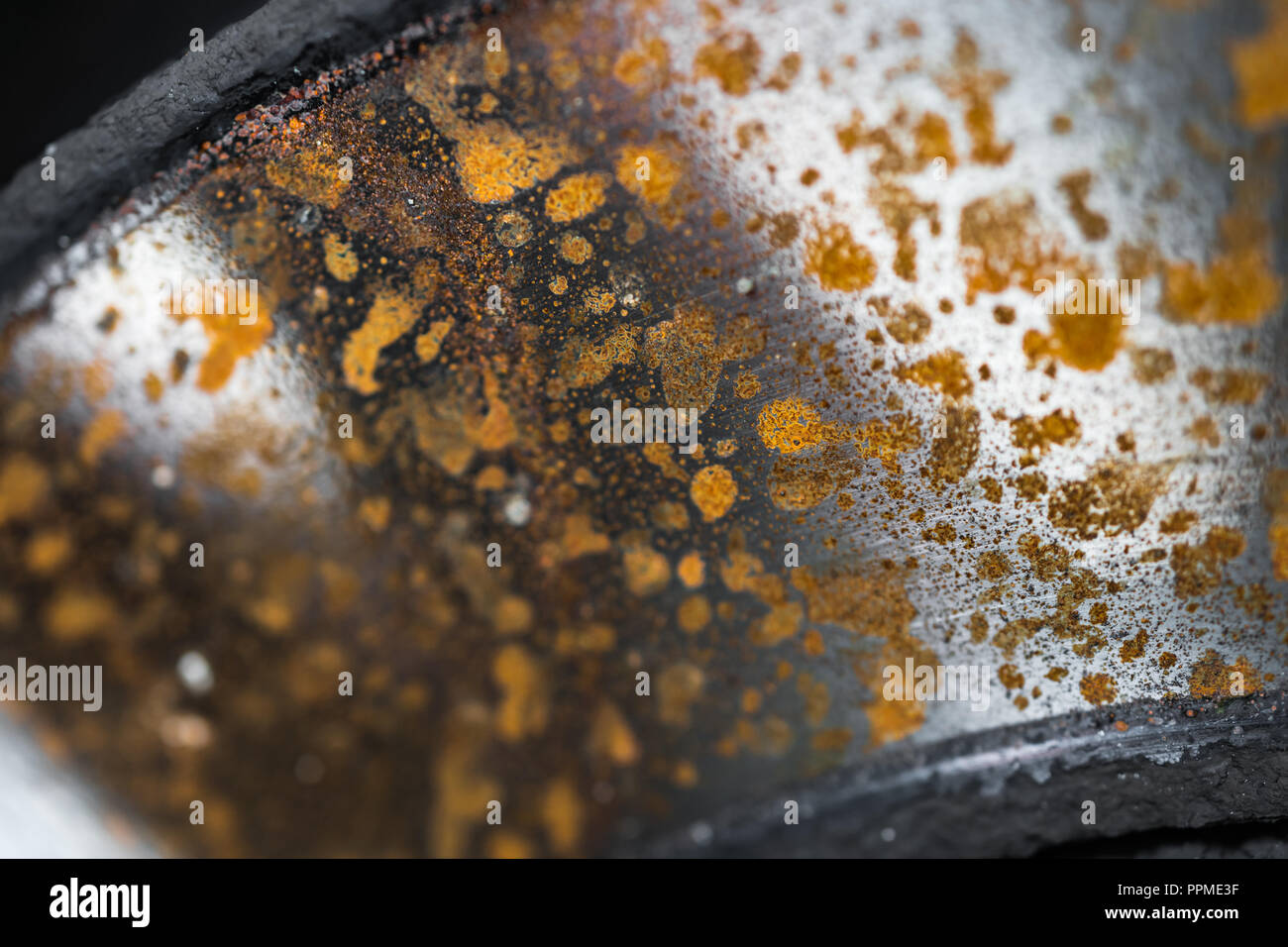 Abstract closeup view of rust on a metal car disc brake. Shallow depth of field Stock Photo Alamy