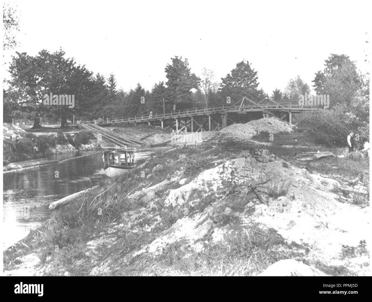 Boat under the Redmond Bridge over Sammamish Slough on Decoration Day