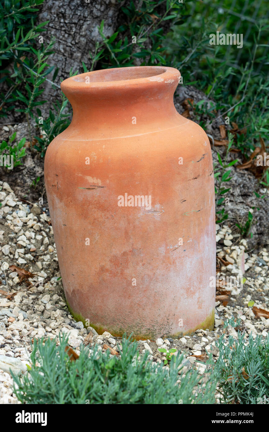 Vintage earthenware clay pots for wine and water containment used as  decorative objects in a garden Stock Photo - Alamy