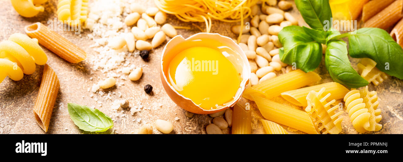 Healthy raw ingredients for italian pasta sauce Carbonara Stock Photo