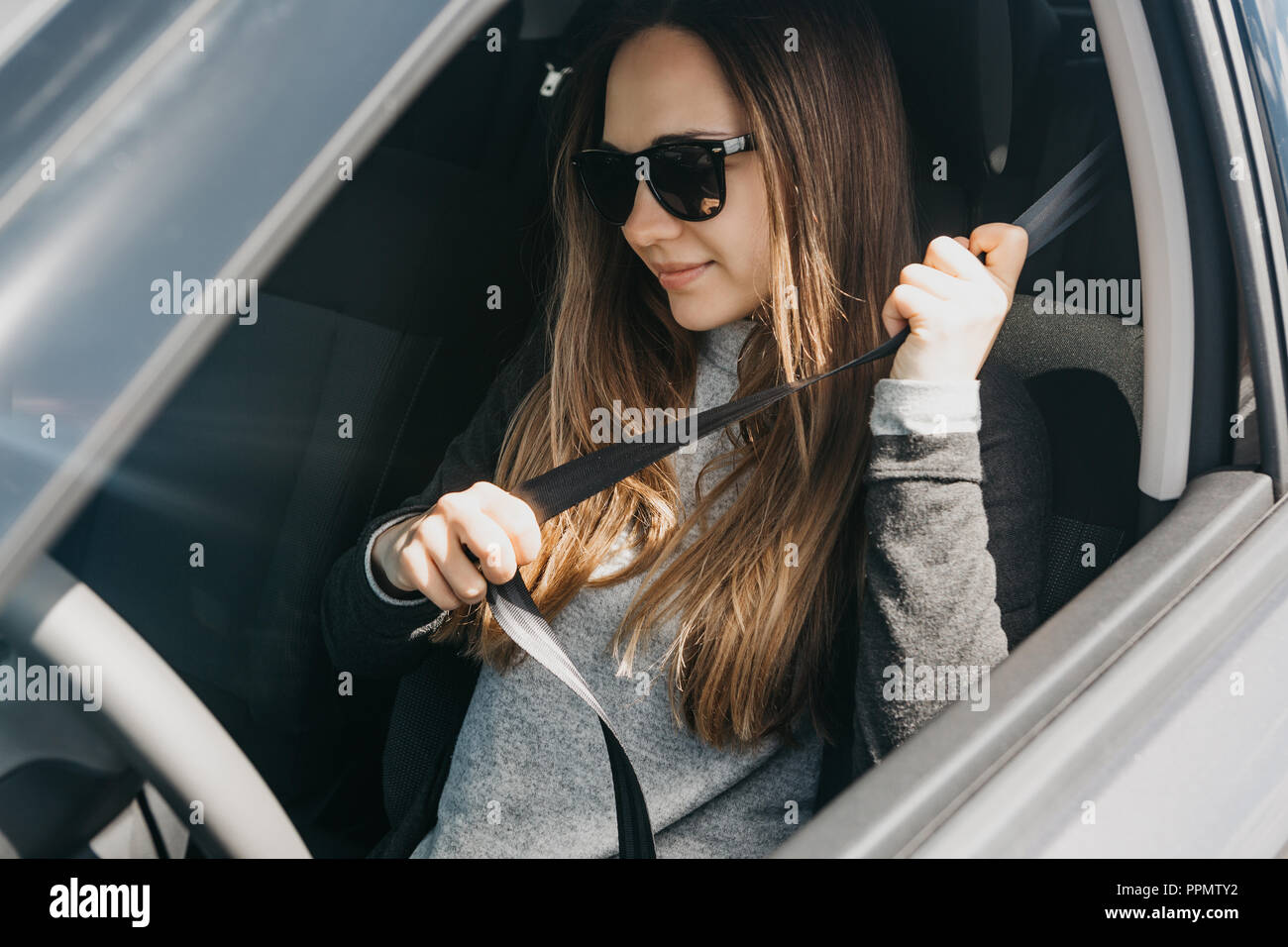 Woman car seatbelt seat belt hi-res stock photography and images - Alamy