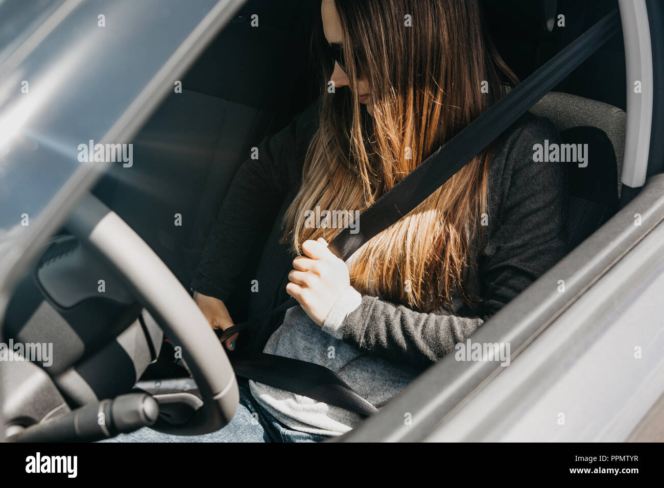 Woman car seatbelt seat belt hi-res stock photography and images - Alamy