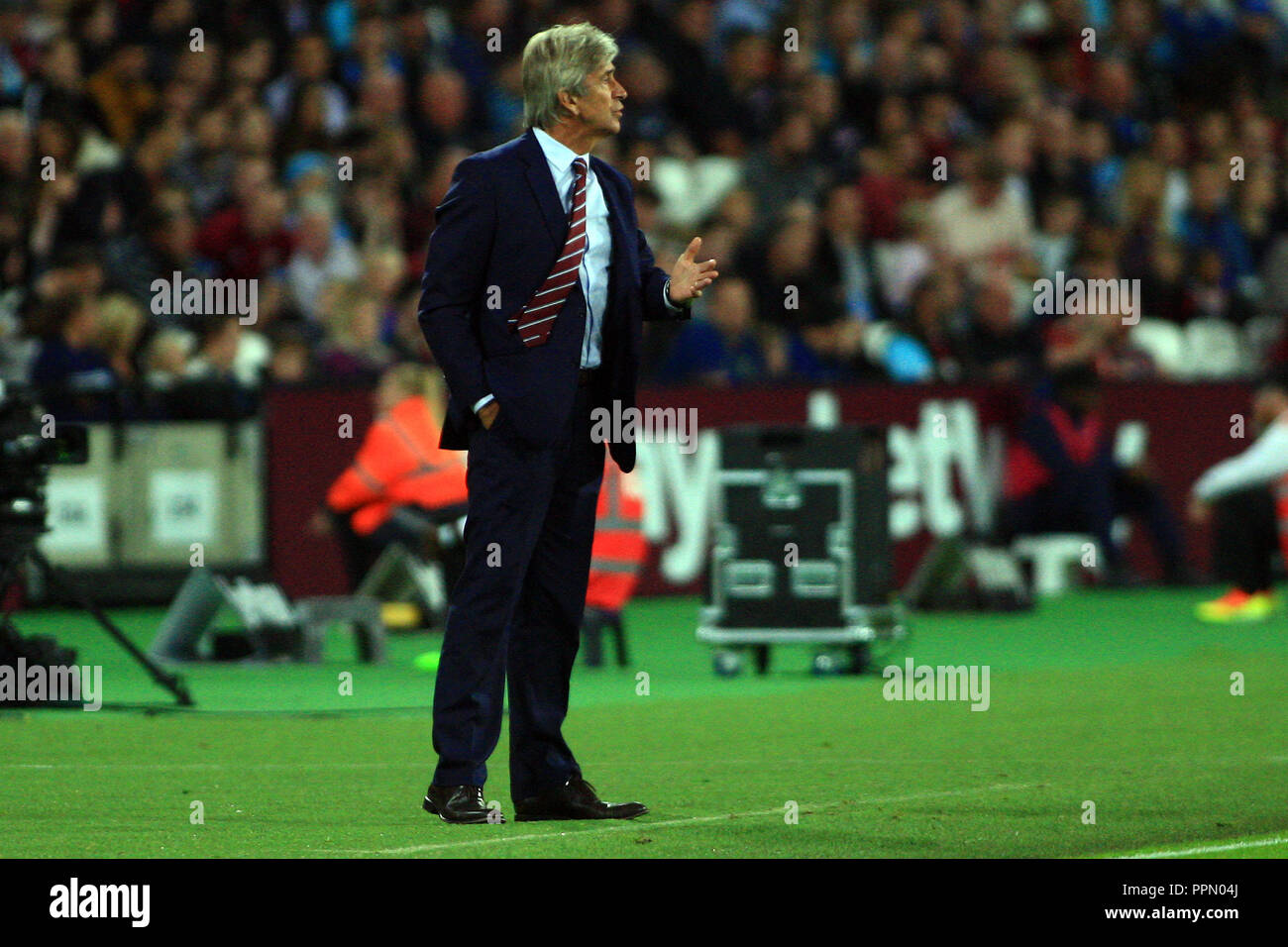 London, UK. 26th September 2018. West Ham United Manager Manuel Pellegrini in action. EFL cup, Carabao cup 3rd round match, West Ham United v Macclesfield Town at the London Stadium, Queen Elizabeth Olympic Park in London on Wednesday 26th September 2018.  this image may only be used for Editorial purposes. Editorial use only, license required for commercial use. No use in betting, games or a single club/league/player publications . pic by Steffan Bowen/Andrew Orchard sports photography/Alamy Live news Stock Photo