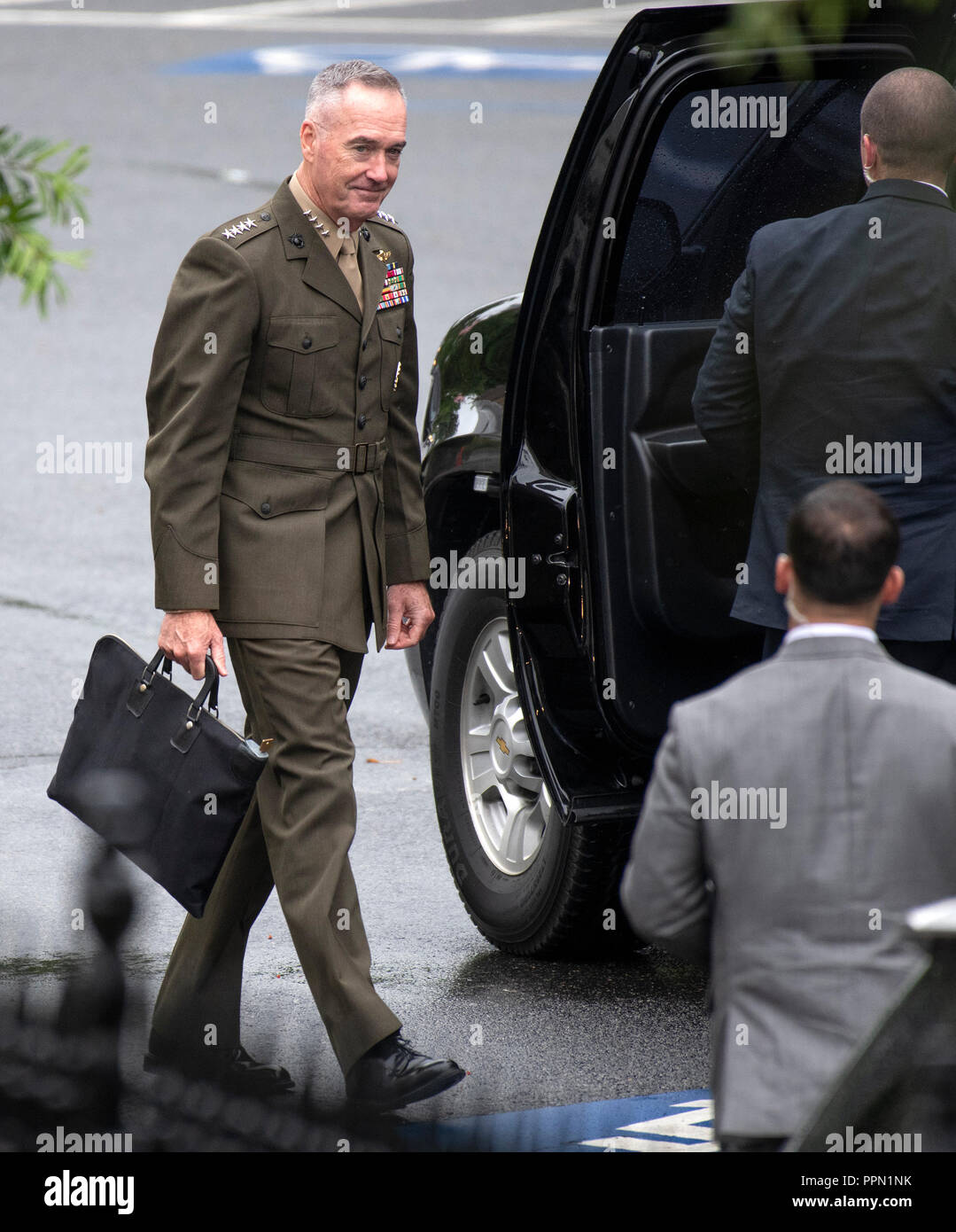 United States Marine Corps General General Joseph F. Dunford, Jr., Chairman of the Joint Chiefs of Staff, departs a meeting at the White House in Washington, DC that included US Deputy Attorney General Rod Rosenstein on Monday, September 24, 2018. Credit: Ron Sachs/CNP (RESTRICTION: NO New York or New Jersey Newspapers or newspapers within a 75 mile radius of New York City) | usage worldwide Stock Photo