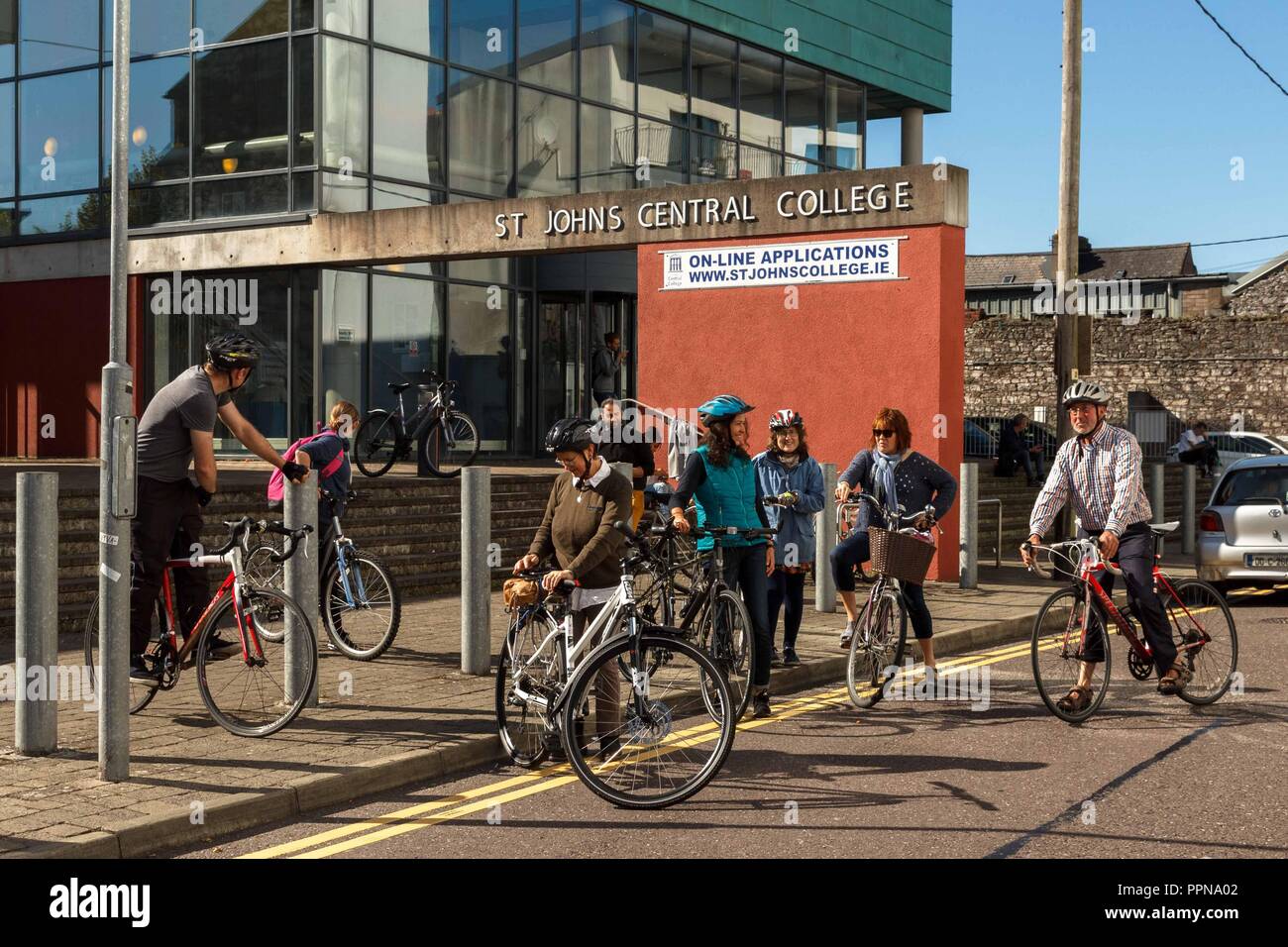 Cork, Ireland. 27th Sept, 2018.   St Johns Central College Student Staff Cycle for Campus Cycle Week, Cork City. Today at 1pm both students and staff gathered in the plaza of St Johns Central College on the annual student staff cycle. The cycle was lead by John Dean, a teacher in the college. The student staff cycle was a part of Campus Cycle Week which runs from September 24th to the 28th. Credit: Damian Coleman/Alamy Live News. Stock Photo