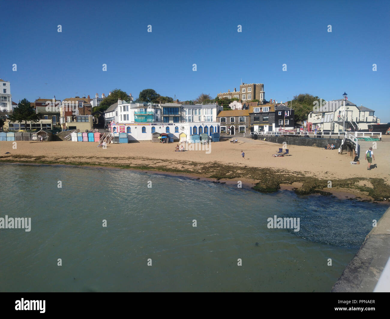 Broadstairs, Kent. 27th Sept 2018. UK Weather: Some people enjoying a sunny and warm day in late Autumn at Viking Bay in Broadstairs on the North Kent coast in England Great Britain UK Credit: Shaun Higson - Image Collection/Alamy Live News Stock Photo