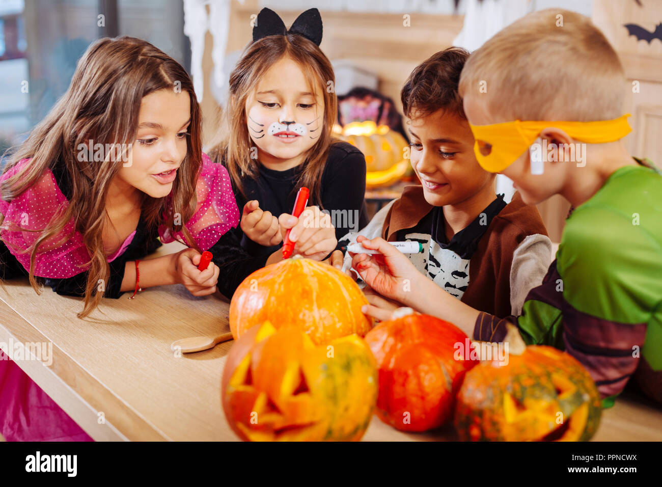 Painted pumpkin faces hi-res stock photography and images - Alamy