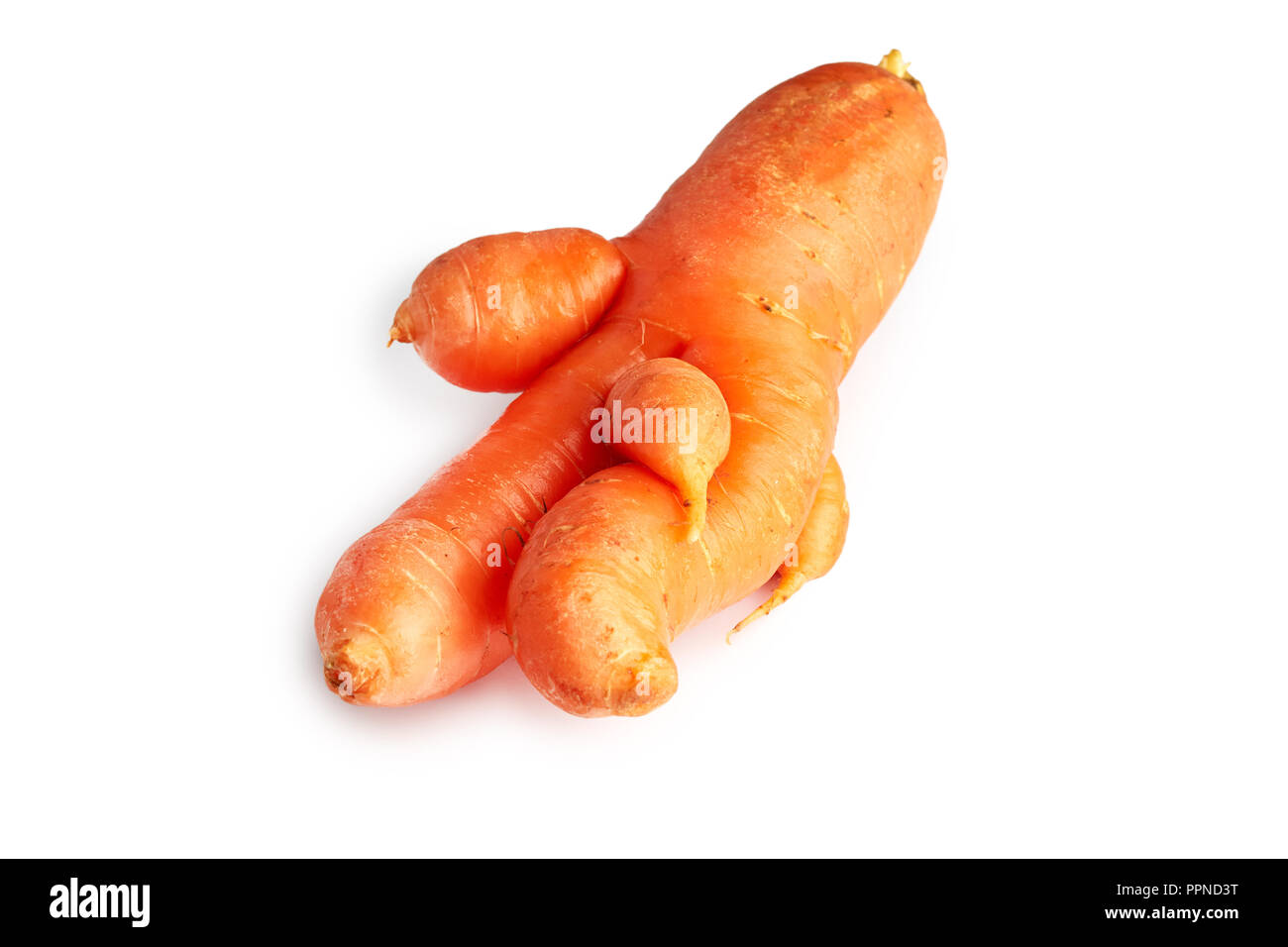 Imperfect fresh organic carrot isolated on white background Stock Photo
