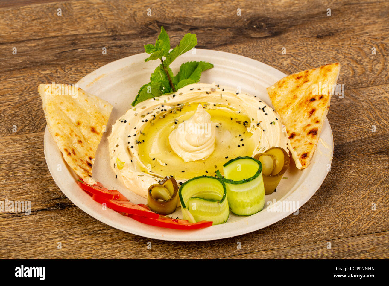 Traditional humus with oil and pita bread Stock Photo - Alamy