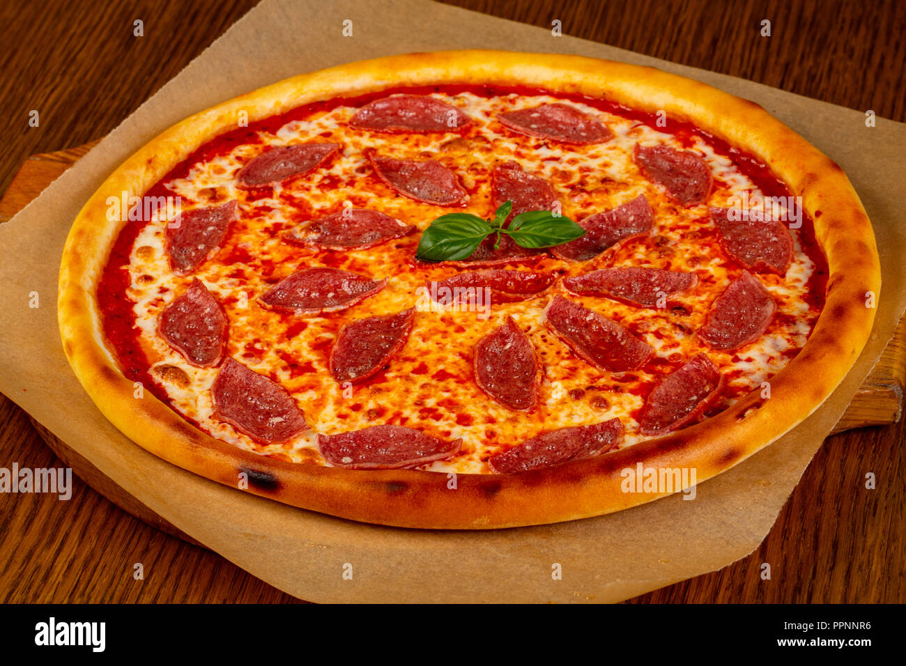 Pizza Pepperoni with salami sausages Stock Photo Alamy