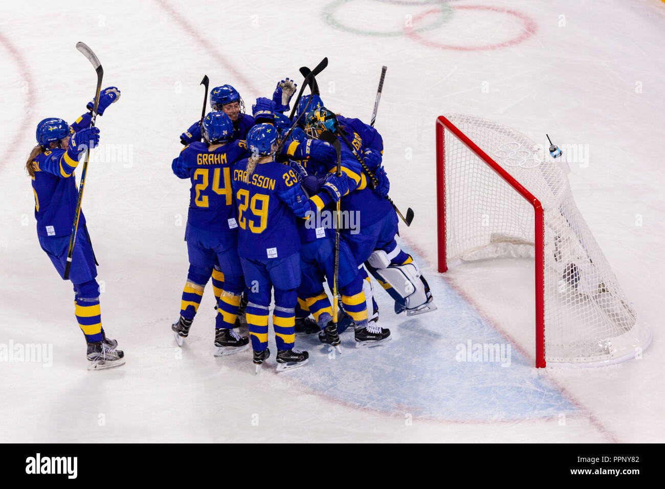 Team Sweden vs Team Japan competing in Women's hockey at the Olympic