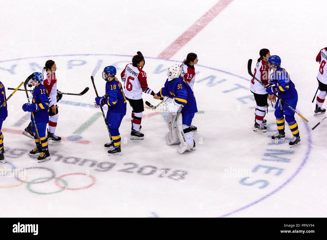 Team Sweden vs Team Japan competing in Women's hockey at the Olympic