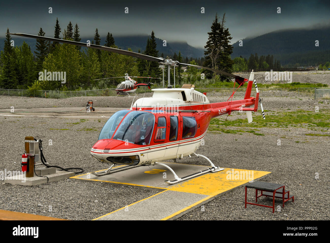CANMORE, ALBERTA, CANADA - JUNE 2018: Bell 206 Longranger helicopter operated by Alpine Helicopters from its base in Canmore. Stock Photo