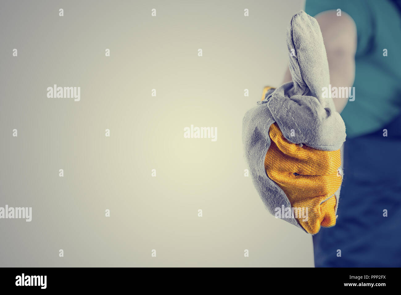 Closeup hand in protective glove hi-res stock photography and images ...