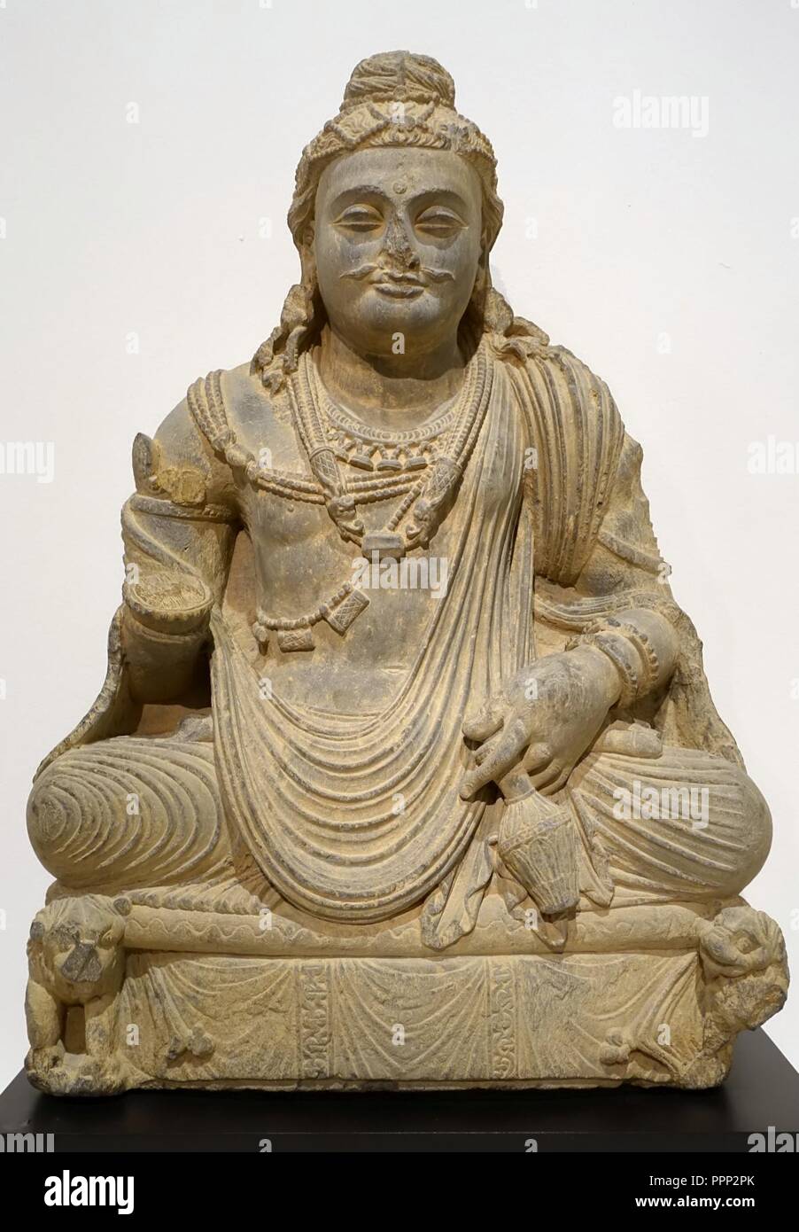Boshisattva Maitreya, India, Gandharan period, 200s-300s AD, gray schist Stock Photo