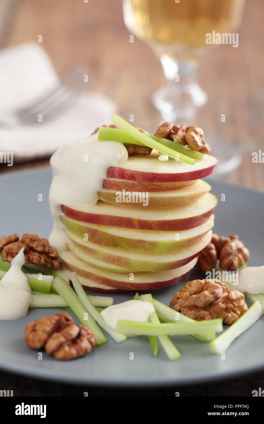 Waldorf salad with apple, celery, walnuts, and mayonnaise Stock Photo