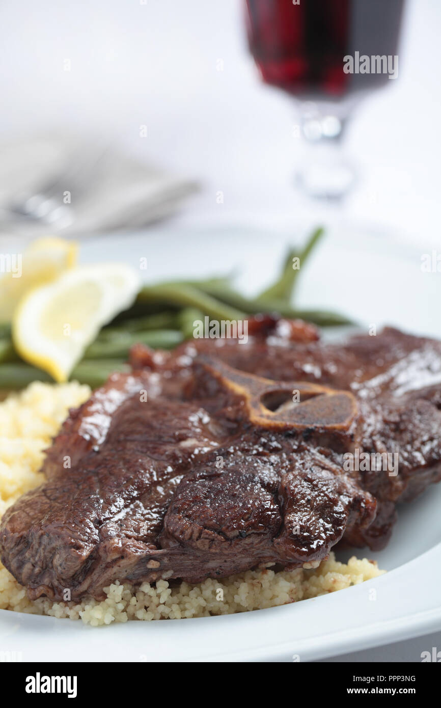 Lamb String Roasted saddle of lamb with couscous and string bean Stock Photo - Alamy