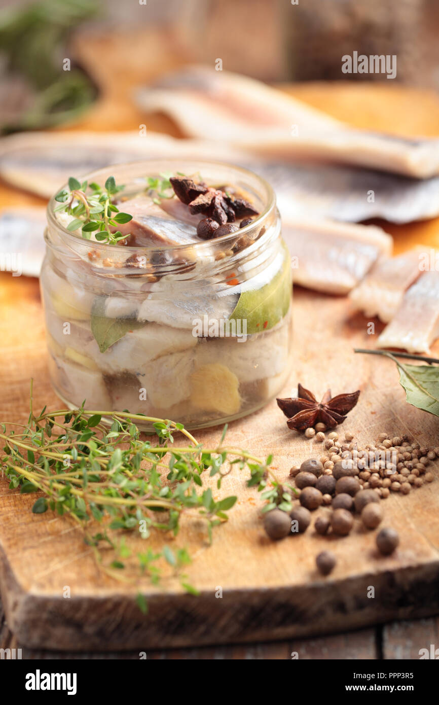 Homemade marinated herring in a jar with spices Stock Photo Alamy