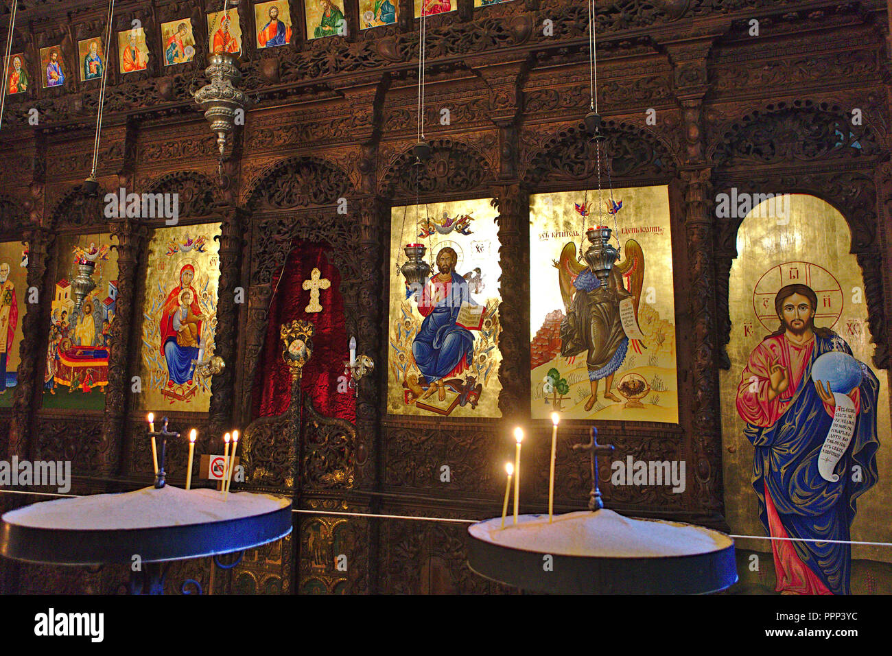 rich view of paintings and wooden engraving inside the church Stock Photo