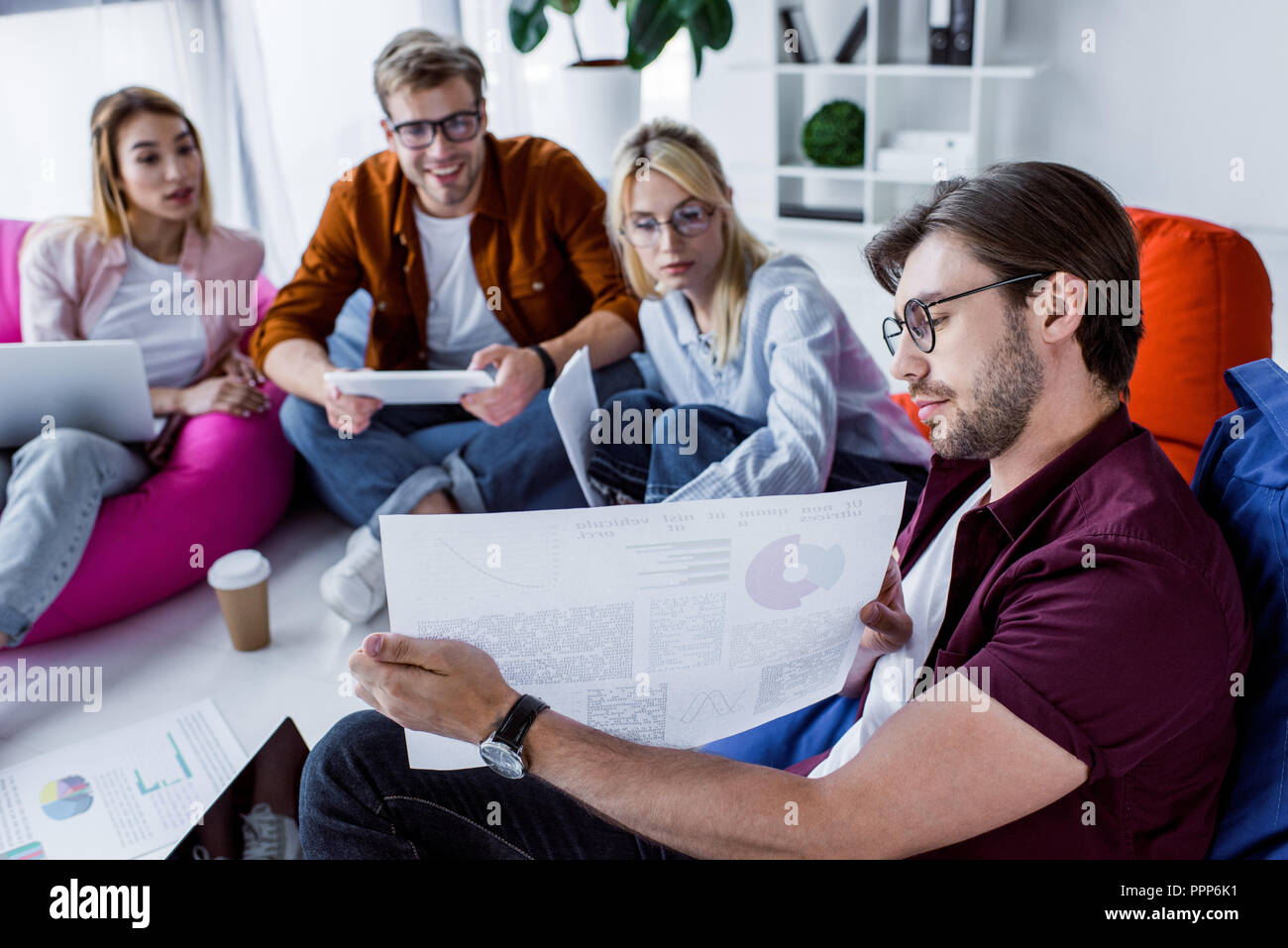multicultural colleagues working on startup project in office Stock ...