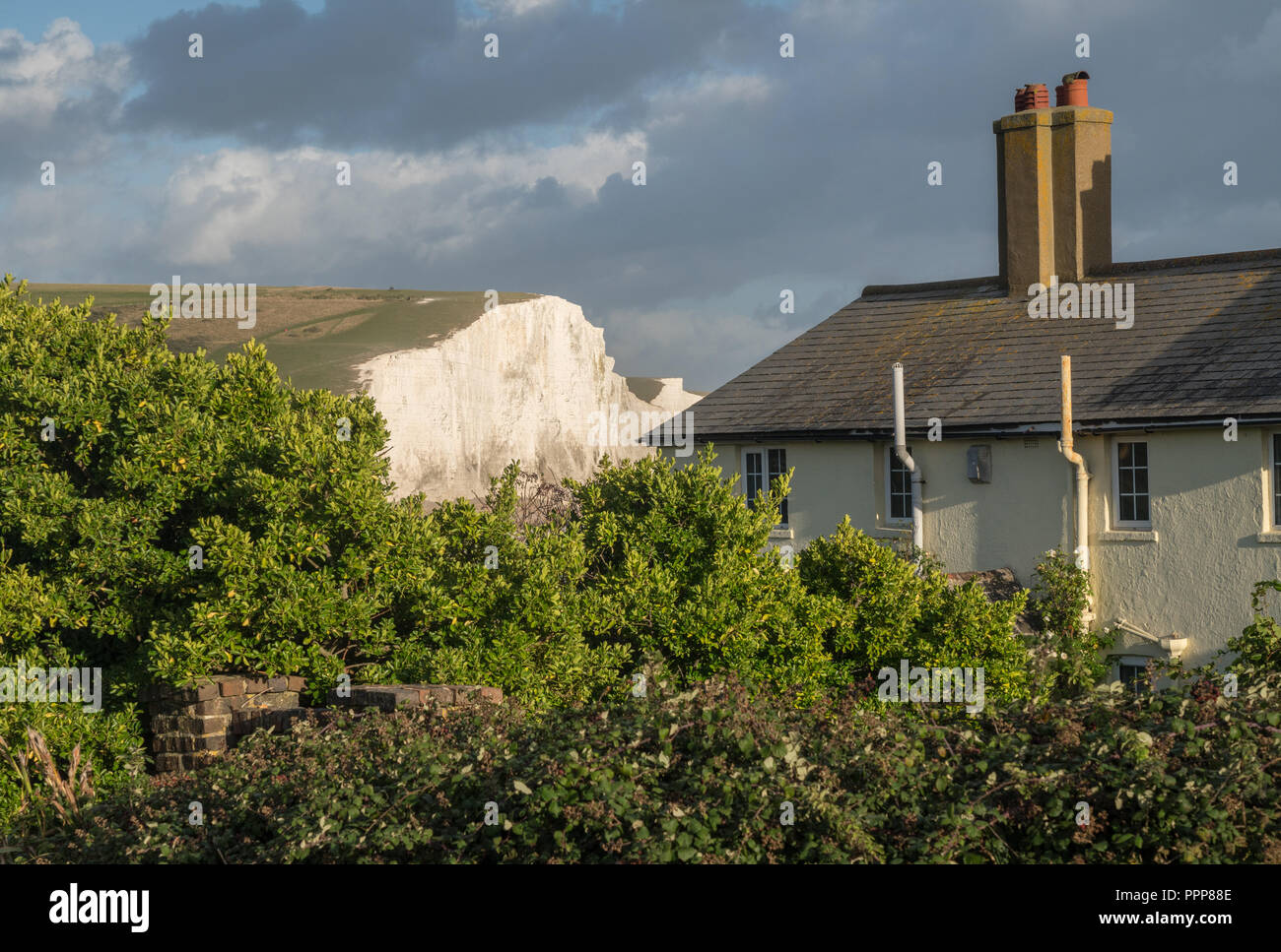 Old Coastguard cottage at Cuckmere Haven with Seven Sisters Stock Photo