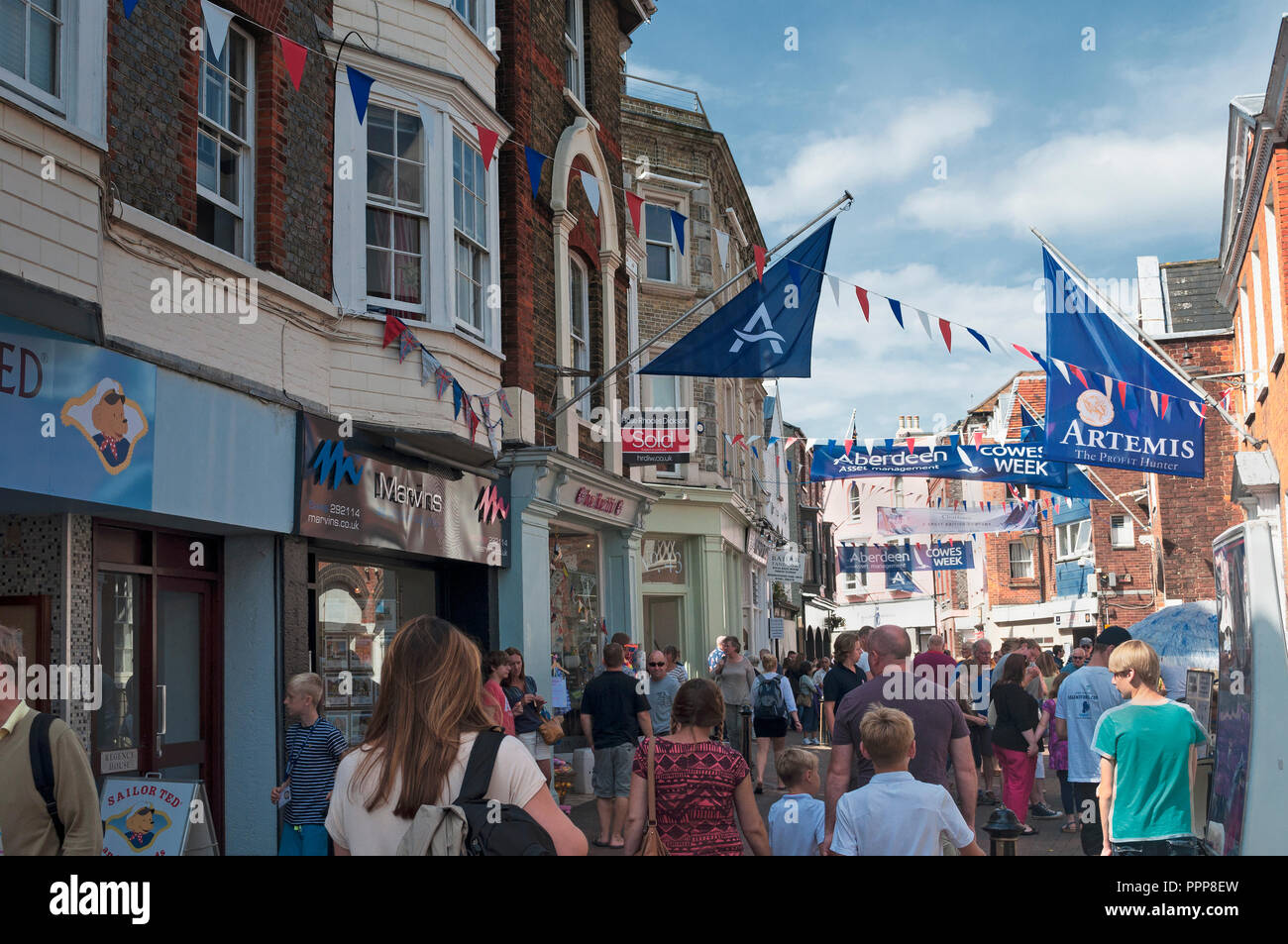 Cowes town centre, crowd of people walking, Cowes Week 2013, Cowes, Isle of Wight, UK Stock Photo