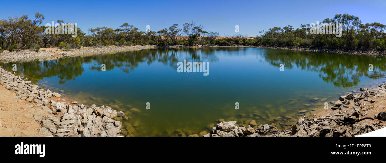 Historic railway water supply dam near Merridan Western Australia Stock Photo