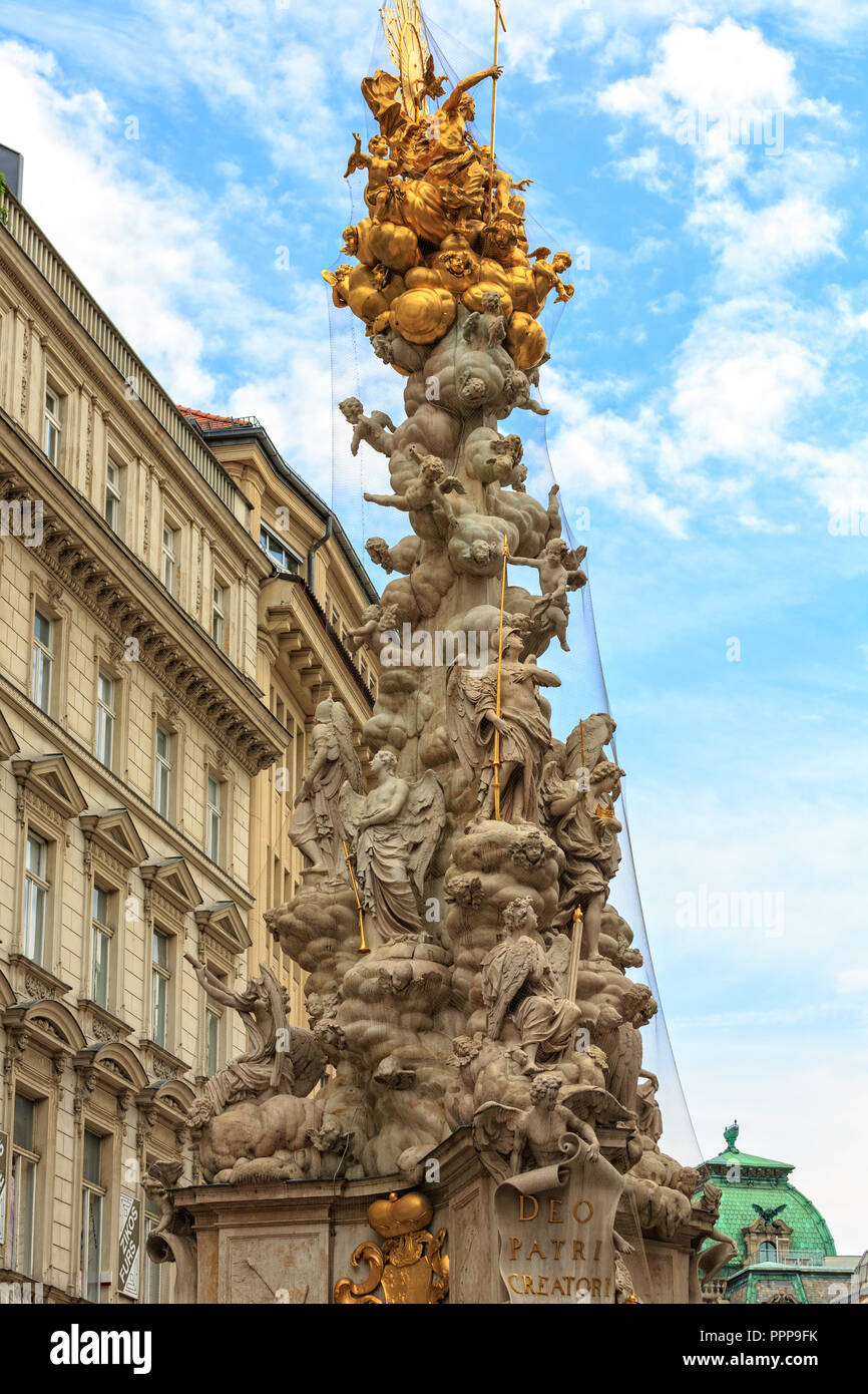 VIENNA, AUSTRIA - JUNE 27, 2015: Monumental Plague column (Pestsaule) on Graben street. The Graben is one of the most famous streets in Vienna first d Stock Photo