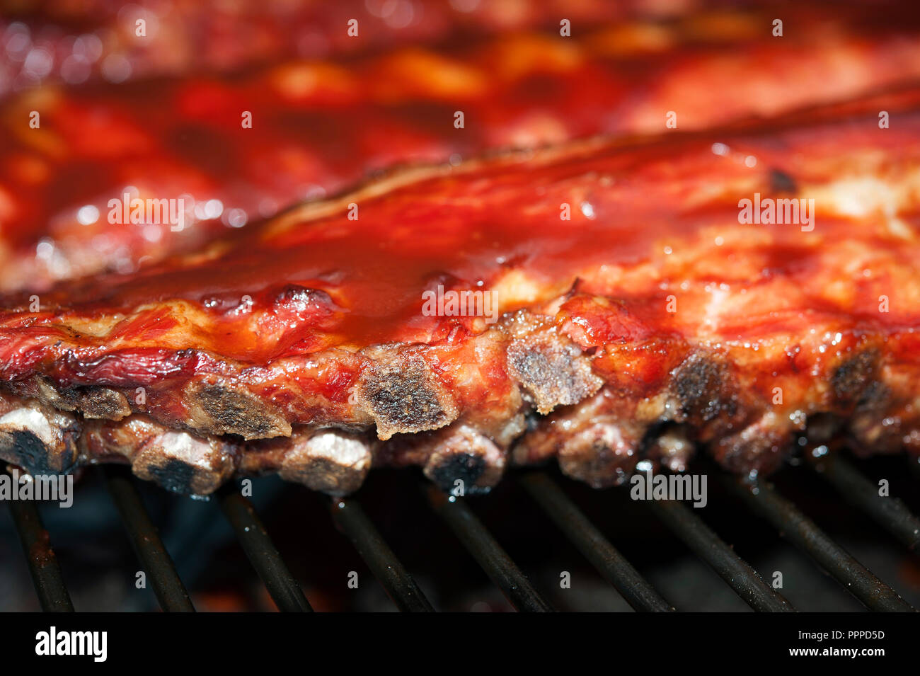 Full Rack Of Pork Ribs Racks of pork ribs cooking on the bar-b-que Stock Photo - Alamy