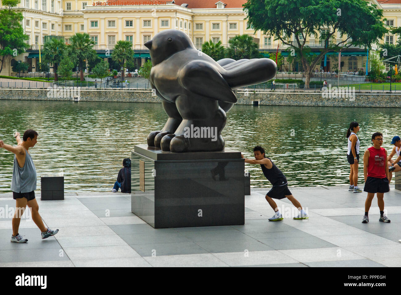 This huge plump bird is the work of Colombian figurative artist Fernando Botero in Singapore Stock Photo