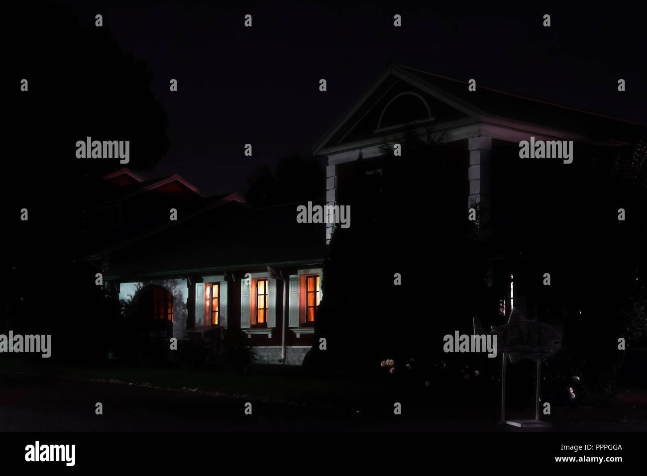 The light in the Windows of a country house. Night, summer, village Stock Photo