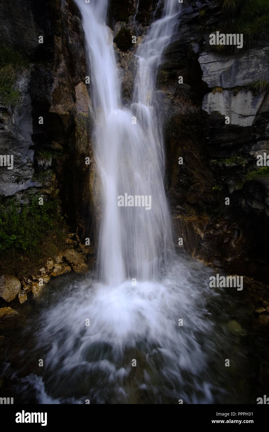 Generic falling water in the rock Stock Photo - Alamy