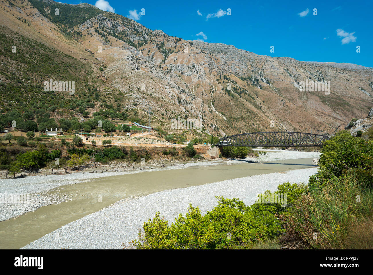 Iron bridge of Dragot, River Vjosa, SH75, Albania Stock Photo