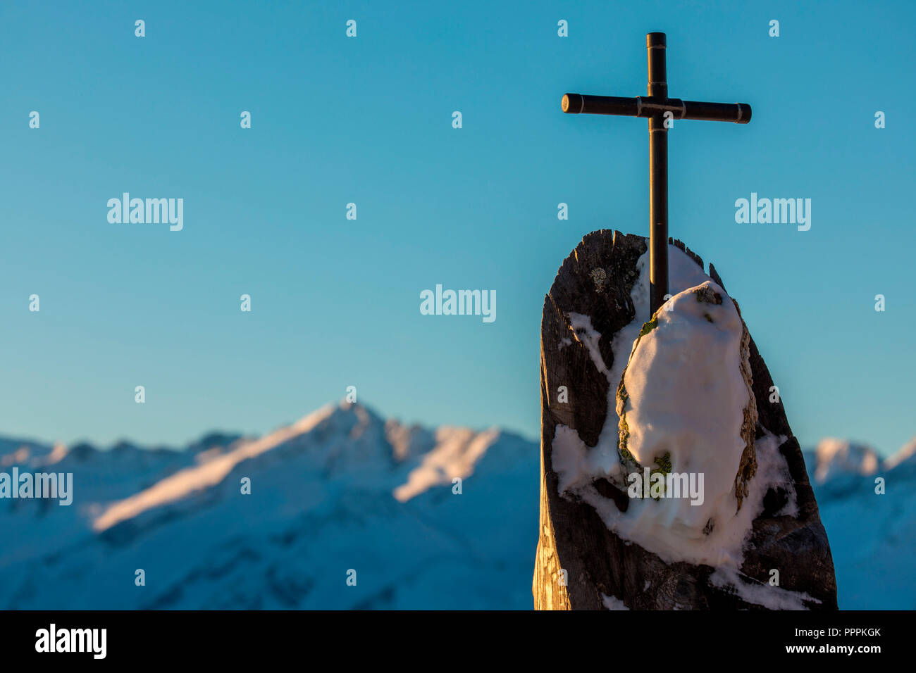 Cross on the Mountain, Wildkogel, Neukirchen, Salzburger Land, Austria Stock Photo