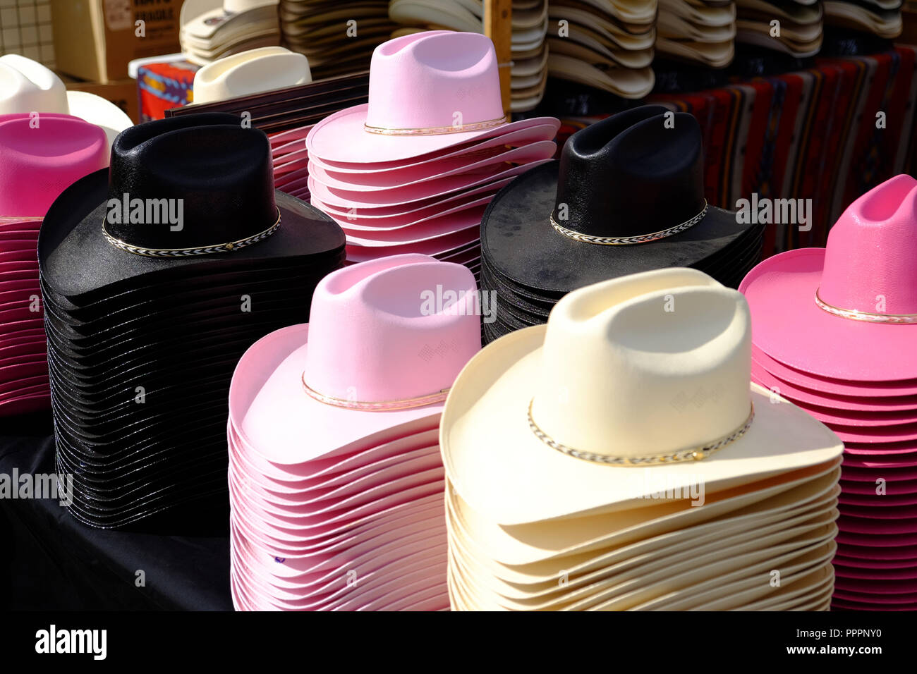 Boy and girl cowboy hats hi-res stock photography and images - Alamy