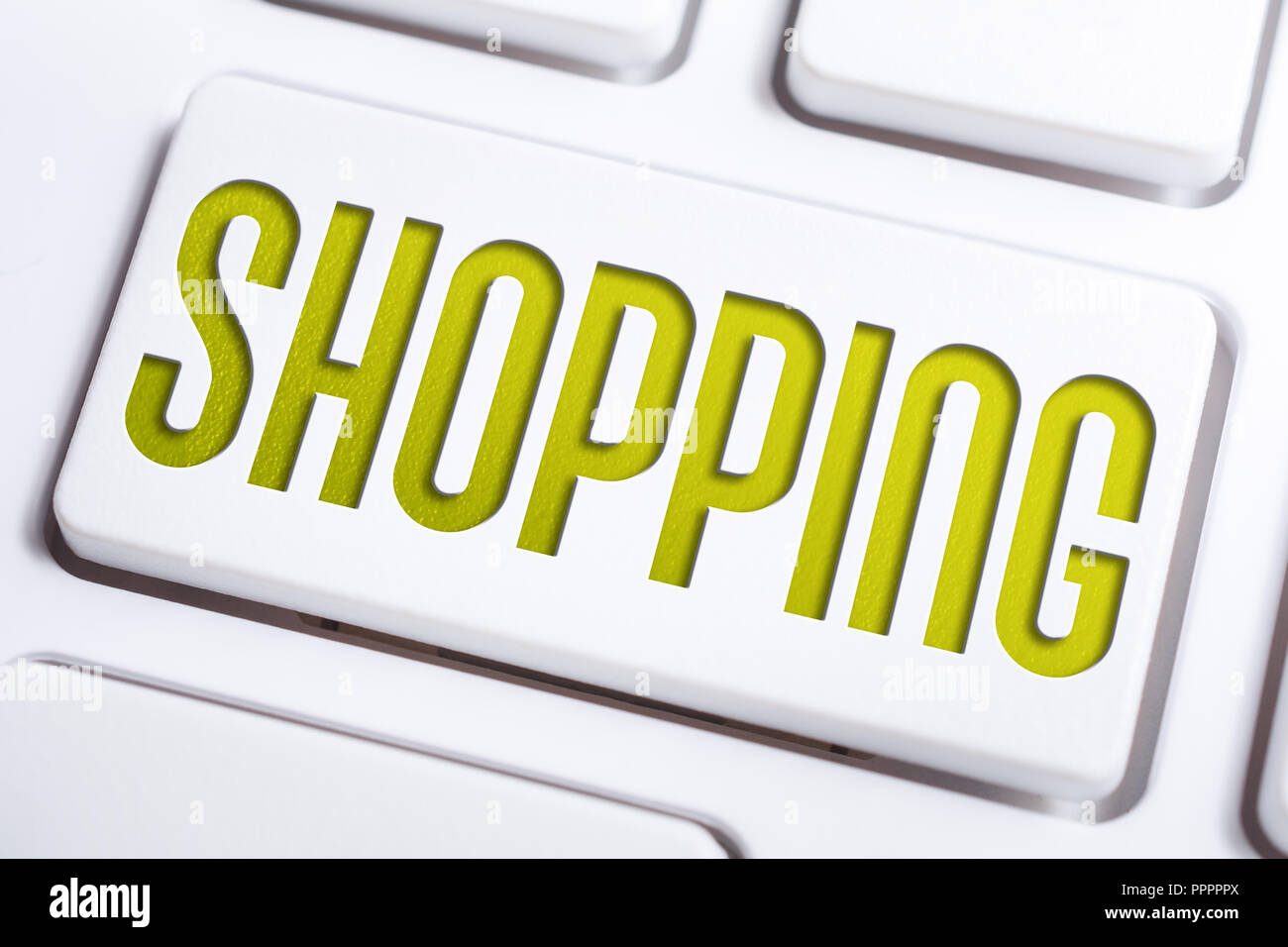 Macro Of The Word Shopping On A Keyboard Button Stock Photo