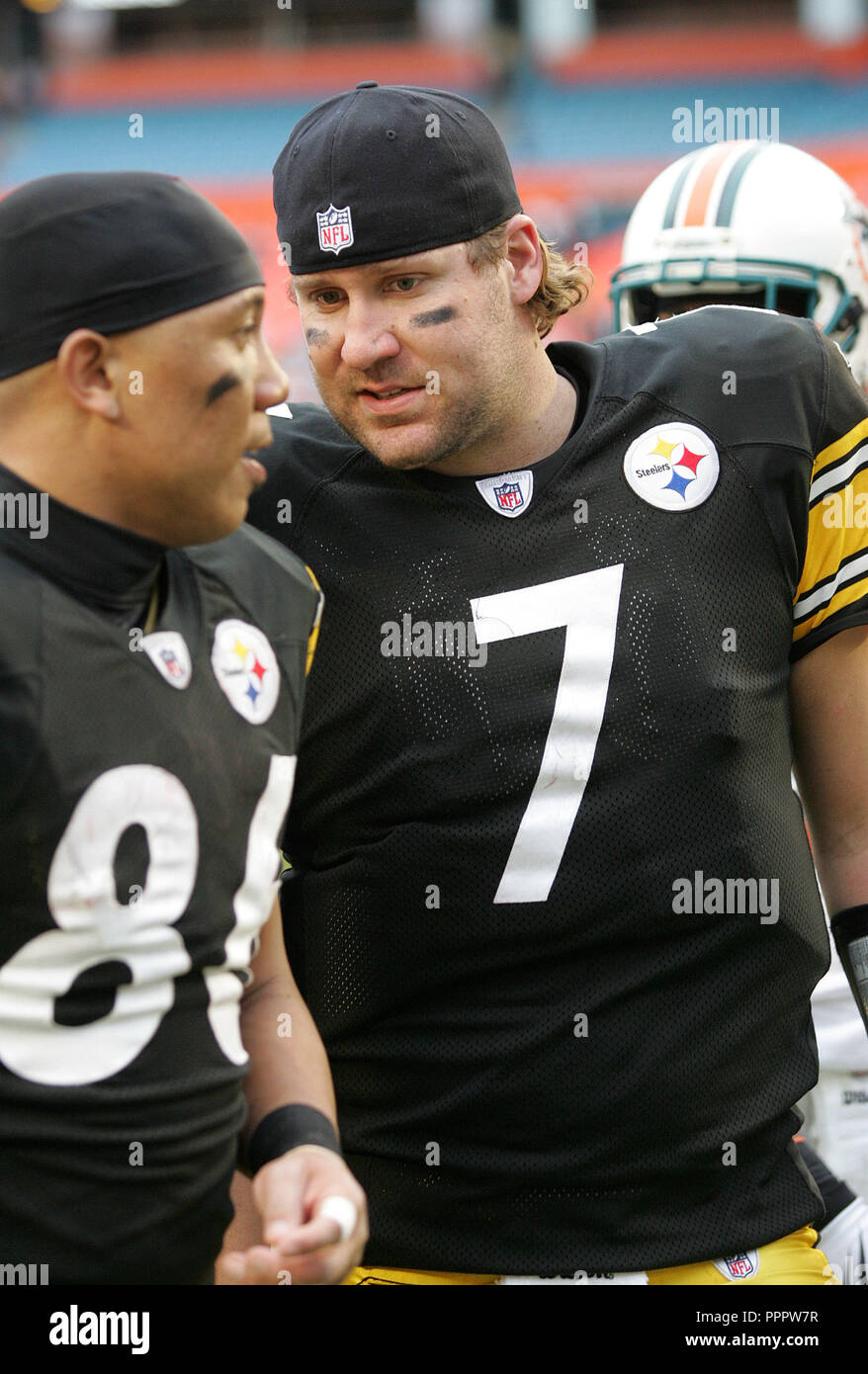 Pittsburgh Steelers quarterback Ben Roethlisberger (7) walks off the field with teammate Hines Ward after defeating the Miami Dophins 30-24 at Landshark stadium in Miami on January 3, 2010. Stock Photo