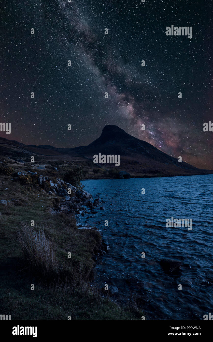 Stunning vibrant Milky Way composite image over landscape of mountain ...