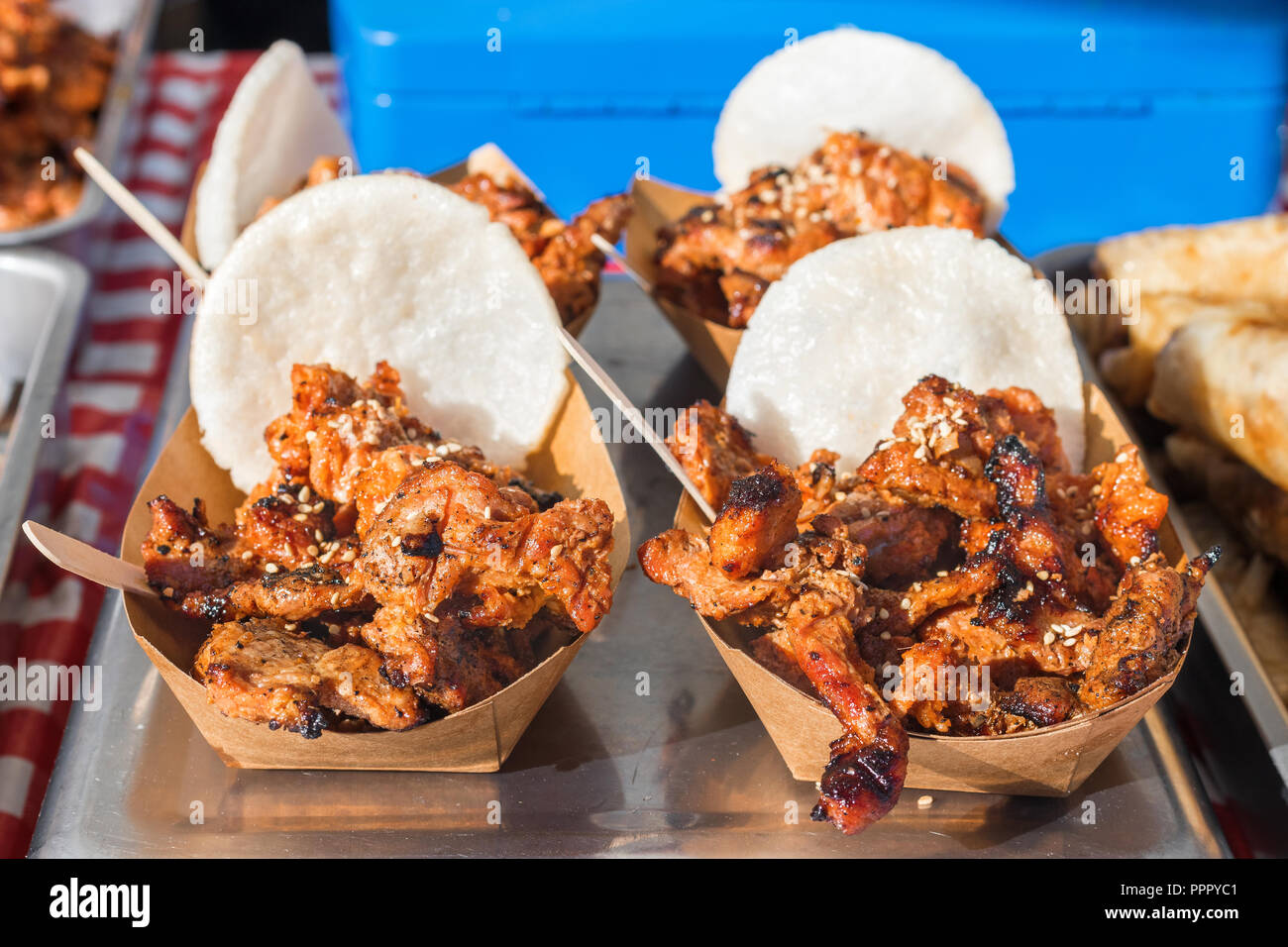 Vietnamese grilled pork meat, Bun Cha, papaer bowls with portions of