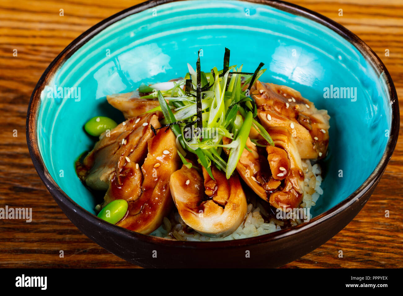 Rice with teriyaki chicken and beans Stock Photo Alamy