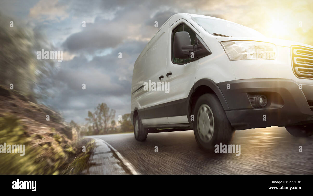 Delivery van on a countryside highway Stock Photo
