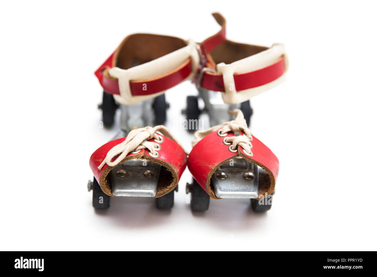 Pair of retro antique skates isolated on the white background Stock