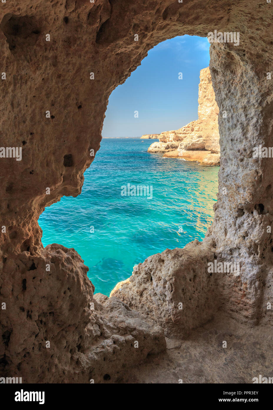 View through a cave window at Algar Seco near Carvoeiro Stock Photo