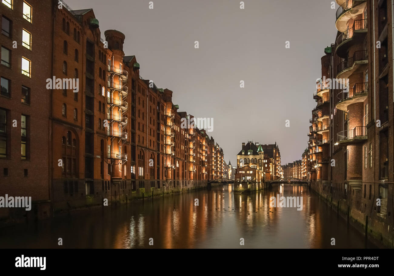 Canal Warehouses in Downtown District of Hamburg Germany, Wasserschloss, Speicherstadt Stock Photo