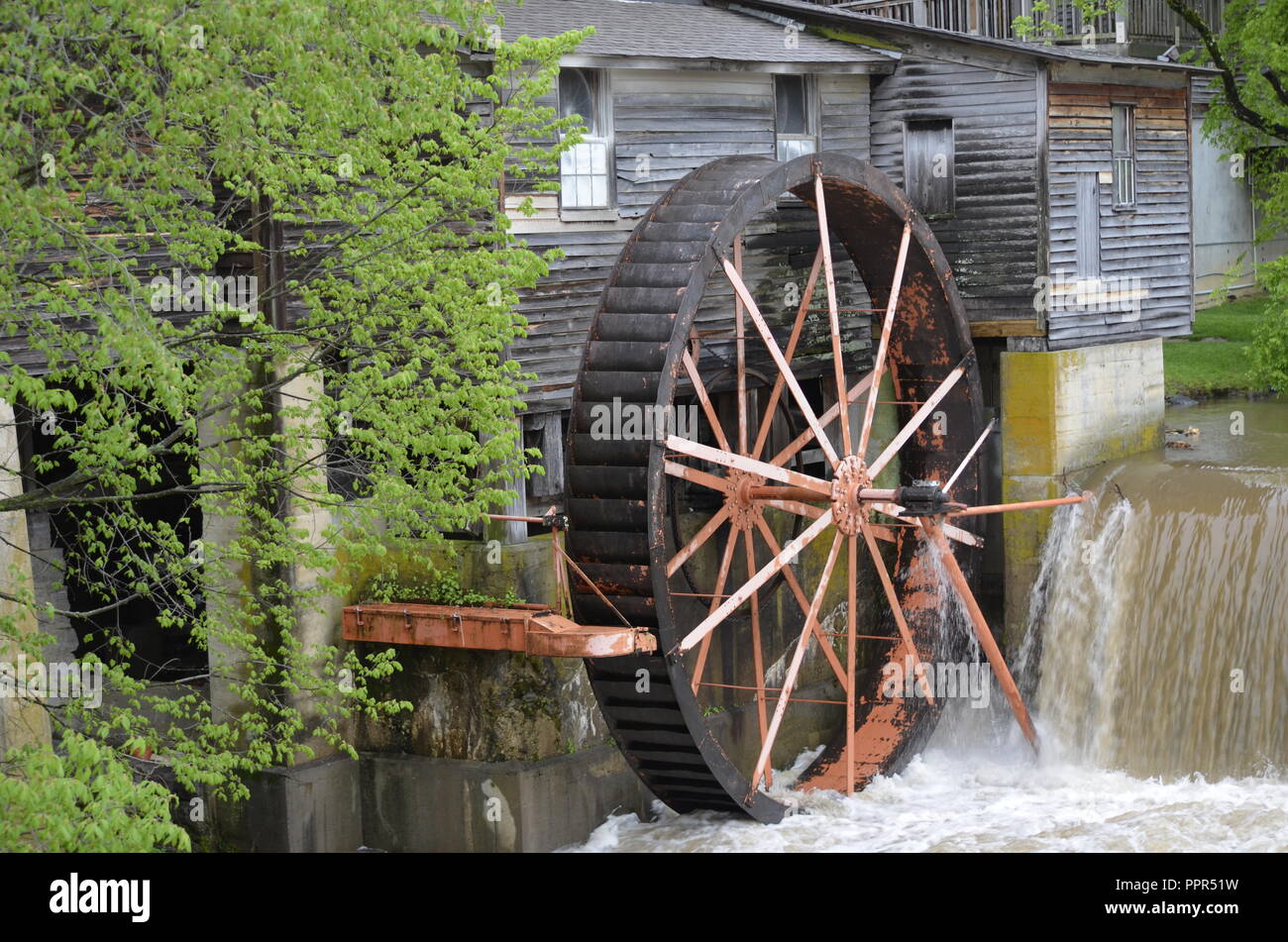 Water wheel at a old Grist Mill in Pigeon Tennessee Stock Photo