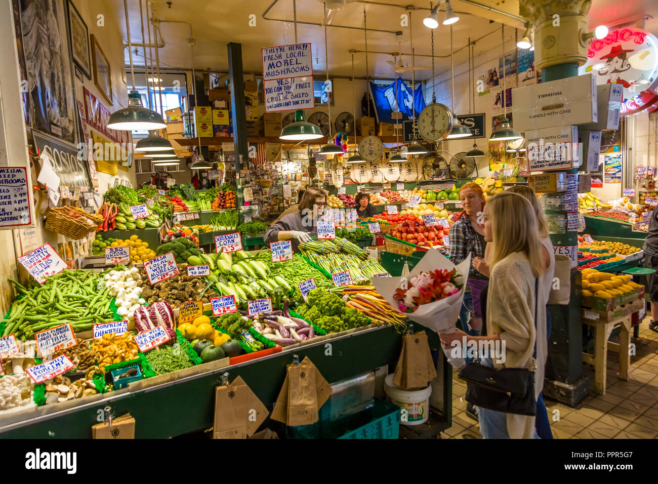 Vegtable stand inside Pike Place Market in Seattle Washington one of