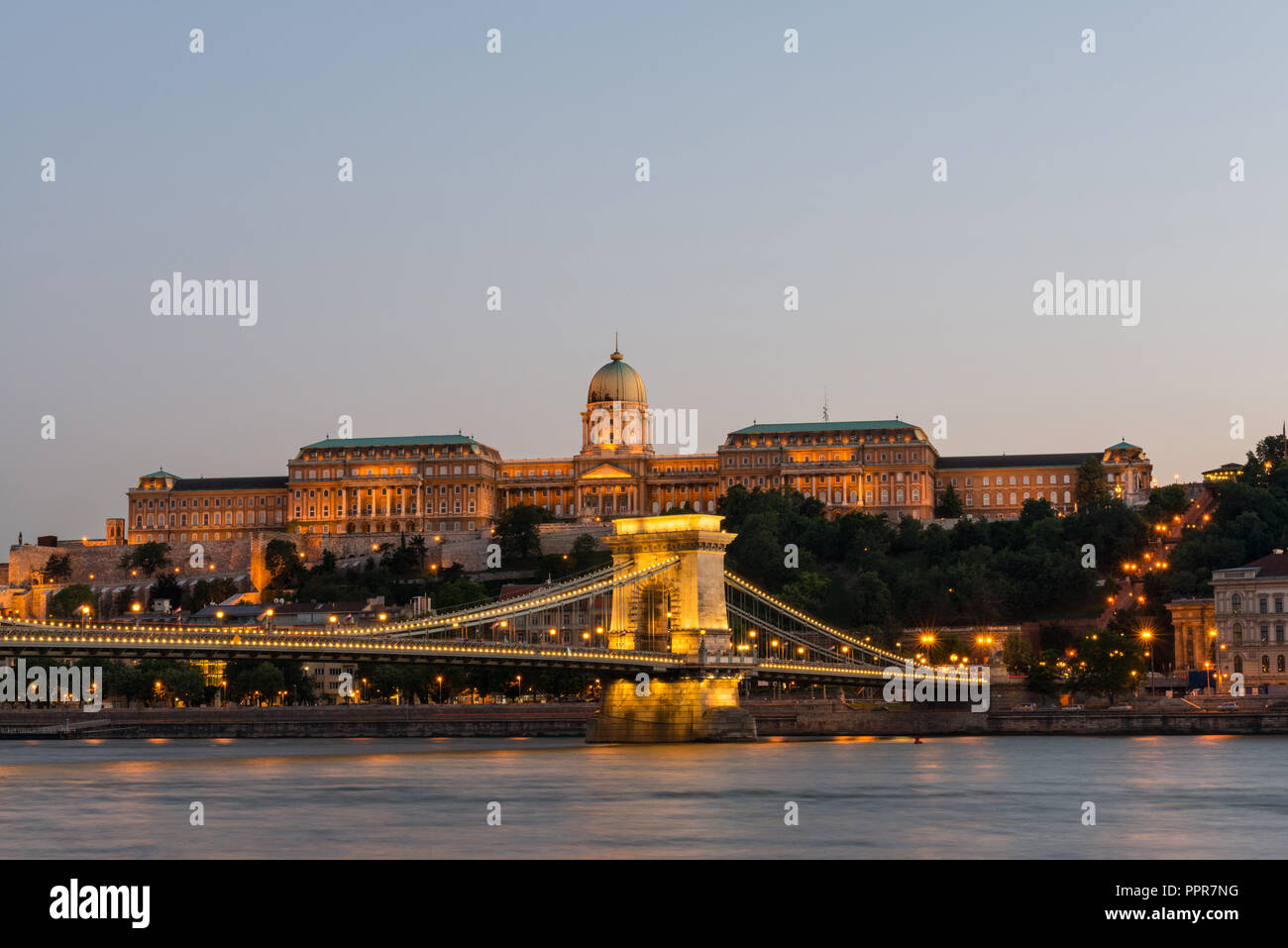 Night view of some of the most famous Hungarian landmarks, including the Széchenyi Chain Bridge and the Royal Palace as seen from the other side of th Stock Photo