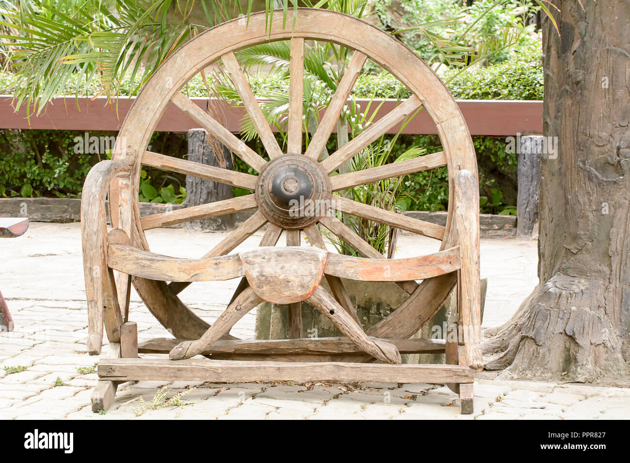 The antique cart Wheels made of wood that looks like the art Stock